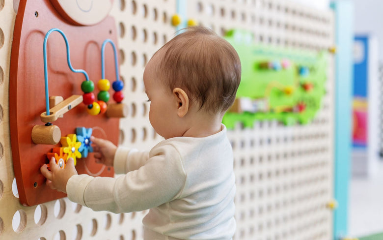 The Magic of Sensory Play (and Busy Boards)