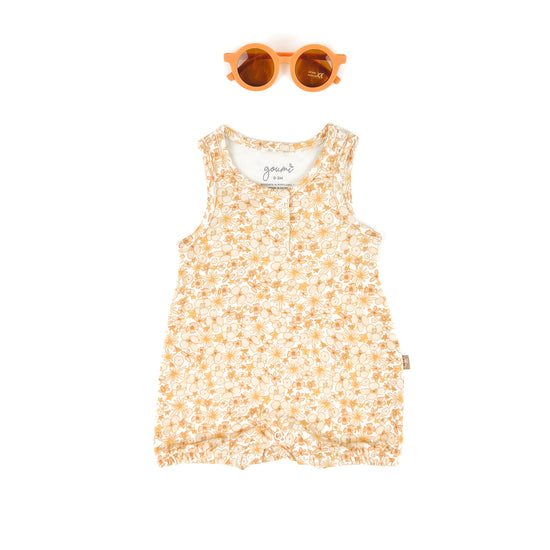 Perfect for warm weather, playdates, and all the moments along the way, this adorable floral romper is oh-so soft and sweet. Featuring quick change bottom snaps for easy diaper changes and sweet button details. 70% bamboo viscose, 30% organic cotton.&nbsp;